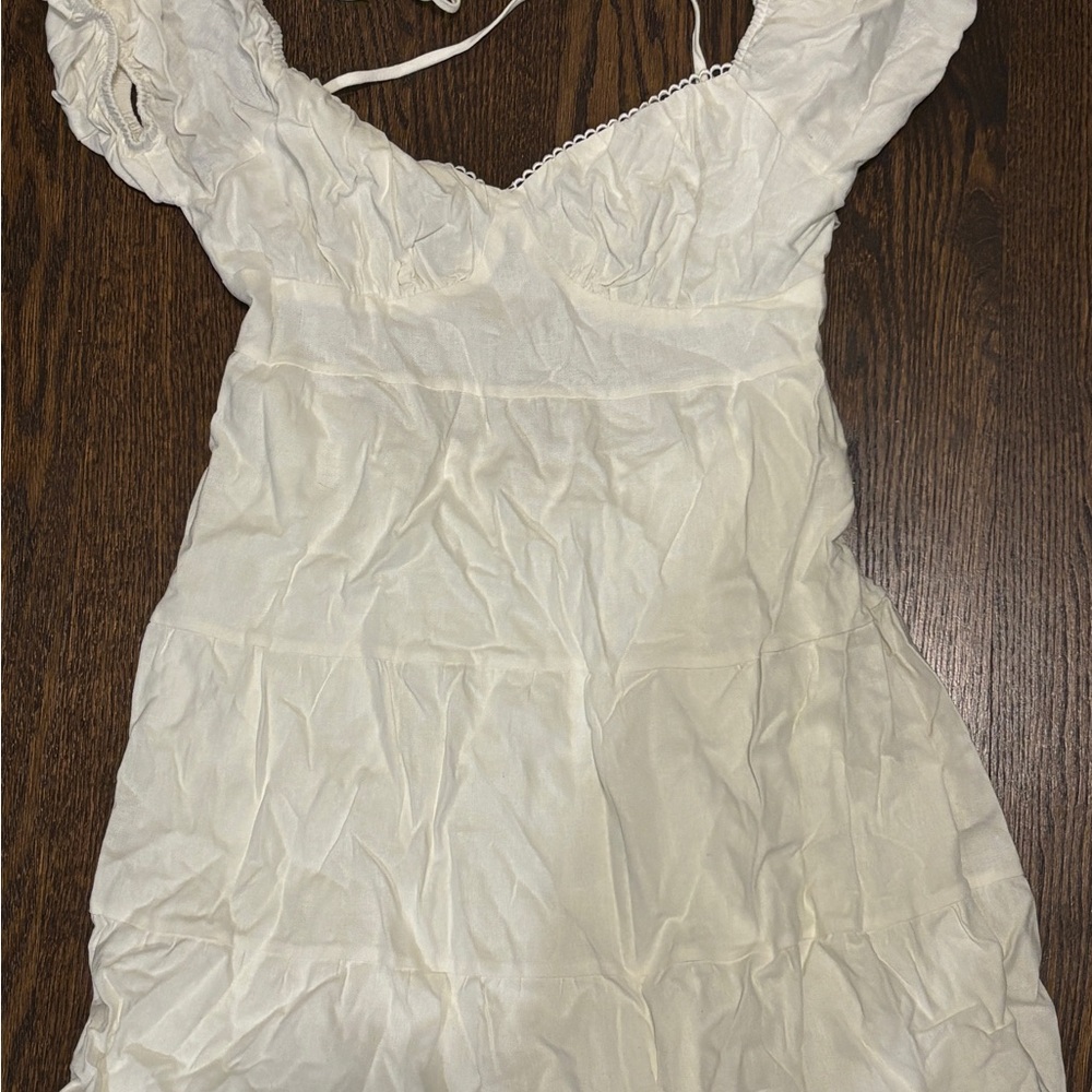 Women’s white dress with open back